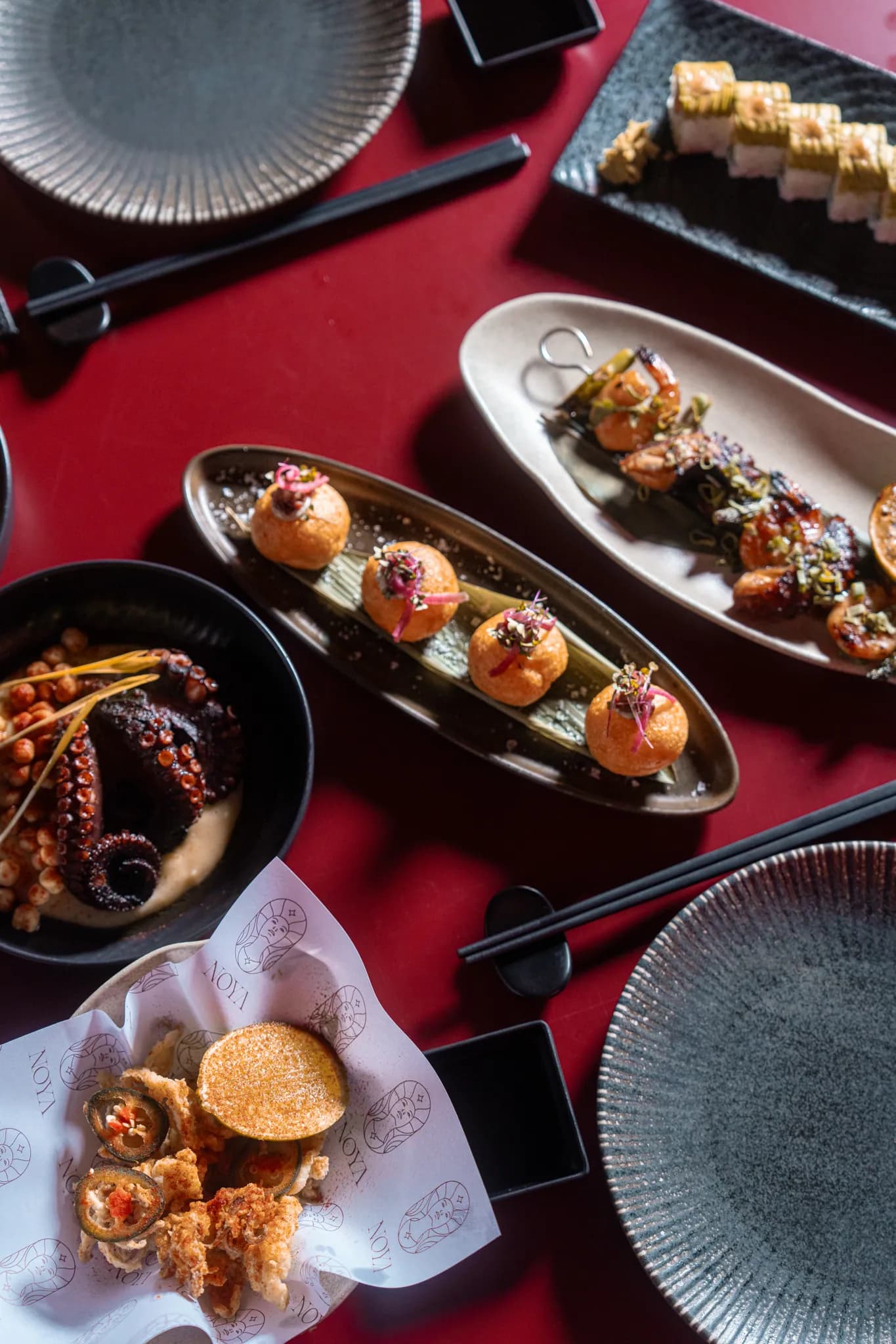 Scallops plated at NOYA